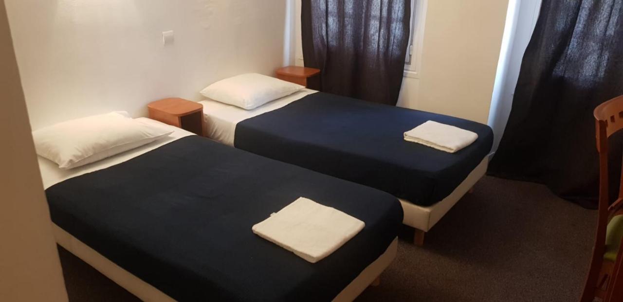 Hotel Petit Bastille Aulnay-sous-Bois Bagian luar foto